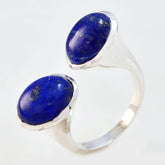 Lucy abstract blue gemstone ring featuring two polished oval blue stones set in silver band