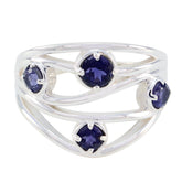 Siti abstract blue gemstone ring with four deep blue stones set in silver twisted band