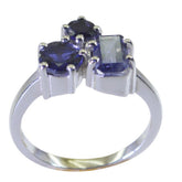 Joaquina abstract blue gemstone ring with three uniquely shaped blue stones in silver setting