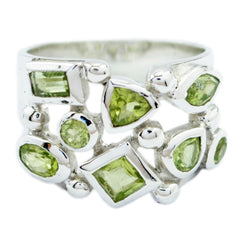 Camilla abstract green gemstone ring featuring various green stones set in silver band