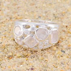 Isla silver band abstract pink gemstone ring with mixed round and square rose quartz and diamond accents on sand