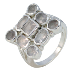 Hazel abstract pink navratna ring with multiple soft pink gemstones set in silver band