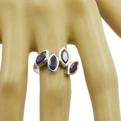 Naomi abstract purple gemstone ring with four marquise-cut stones set in silver band