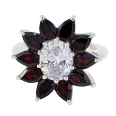 Ellie abstract red gemstone ring with silver band central oval clear stone and marquise red stones in floral arrangement