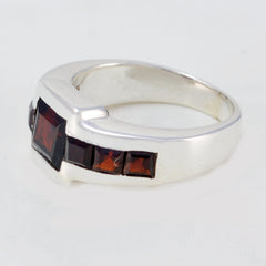 Bruna abstract red gemstone ring with square red stones set in a silver band