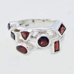 Liyana abstract red gemstone ring with multiple uniquely shaped red stones set in silver band