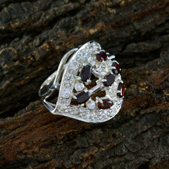 Rosa abstract red stone ring with multiple red stones and clear crystals set in silver metal