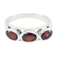 Saanvi abstract red trilogy ring with three oval red gemstones set in silver band