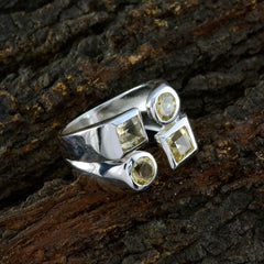 Nella sterling silver ring with three faceted yellow stones on wood background antique yellow gemstone ring