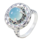 Lucia aqua gemstone statement ring with milky blue cabochon center and sparkling pave crystals in sterling silver