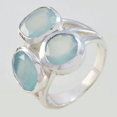 Sarah aqua gemstone trilogy ring with three light blue faceted stones set in silver band