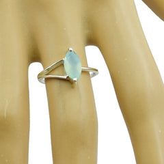 Yan aqua solitaire ring with marquise aqua gemstone set in silver band on finger
