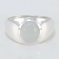 Bruna aqua solitaire ring with a polished silver band and an oval aqua gemstone centerpiece