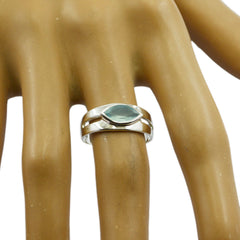 Andrea aqua solitaire ring with marquise-cut blue gemstone set in polished silver band