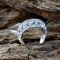 Naomi artisan blue gemstone ring with crescent shape and multiple blue stones on silver band