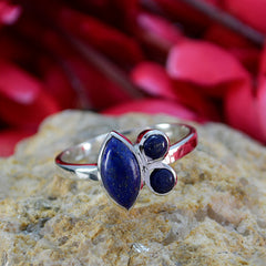 Carla artisan blue gemstone ring with three polished blue stones set in silver band