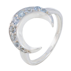 Naomi artisan blue gemstone ring with crescent design and light blue stones in silver setting