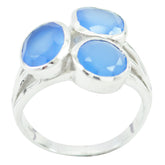 Dewi artisan blue gemstone ring with three faceted blue stones set in a silver band