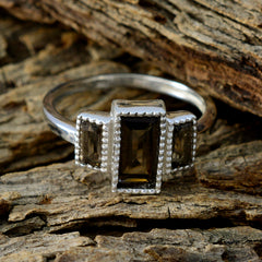 Haruka artisan brown trilogy ring with three rectangular brown stones set in silver band on rustic wood