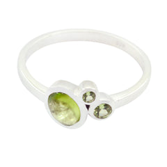 Riya artisan green gemstone ring with three green stones set in a sleek silver band