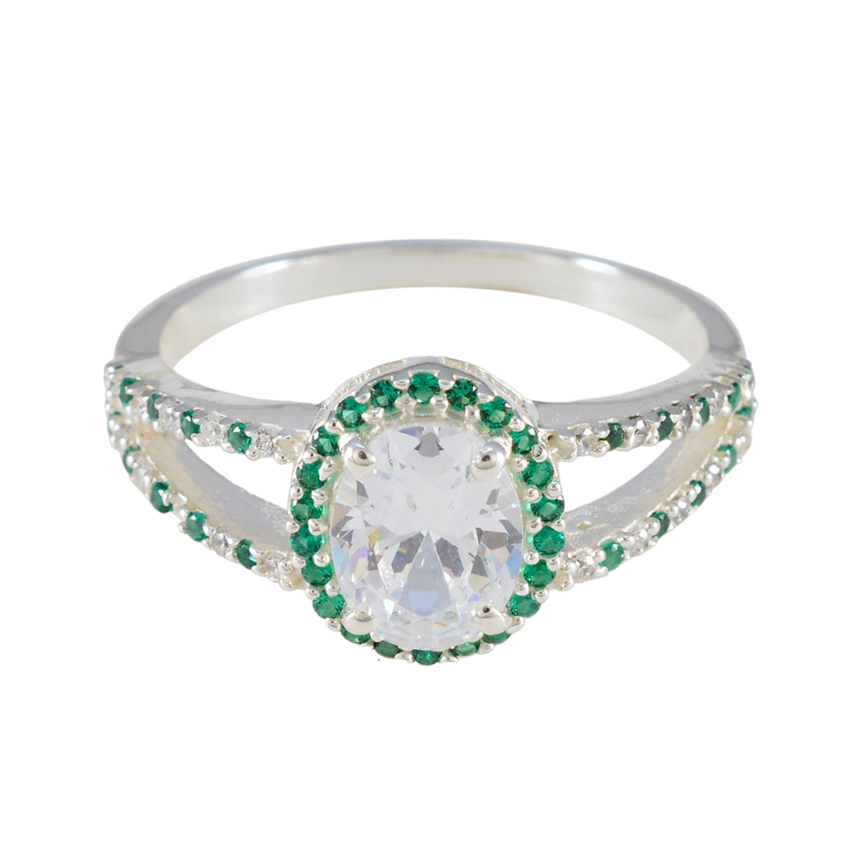 Joaquina artisan green halo ring with oval clear center stone and green gemstones surrounding silver band