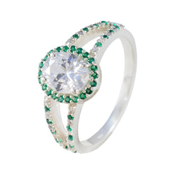 Joaquina artisan green halo ring with split band featuring green and clear gemstones