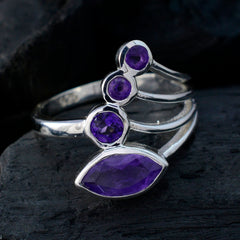 Araya artisan purple gemstone ring with multiple faceted purple stones set in silver band