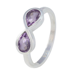 Haruka artisan purple gemstone ring with two teardrop-shaped purple stones set in silver band