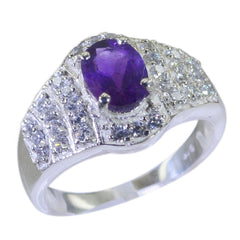 Yasmine artisan purple halo ring with oval amethyst center and pave clear stones on silver band