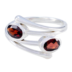 Maria artisan toi et moi ring with two oval red gemstones set in polished silver band