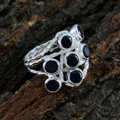 Audrey black gemstone statement ring featuring multiple black stones set in twisted silver bands