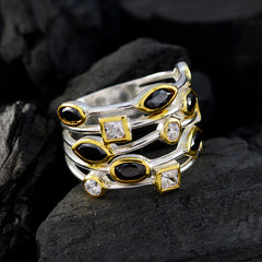 Isabella black gemstone statement ring with gold accents and mixed shaped stones on silver band