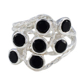 Audrey black gemstone statement ring with multiple round black stones set in silver band