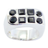 Nora ring featuring multiple black gemstones in a silver band black gemstone statement ring