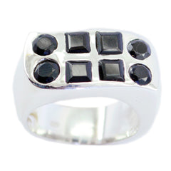 Nora ring featuring multiple black gemstones in a silver band black gemstone statement ring