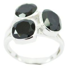 Florencia black gemstone trilogy ring with three faceted black stones set in silver band