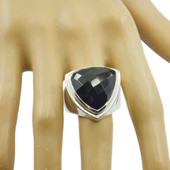Elena black solitaire cocktail ring with large faceted triangular black stone on silver band