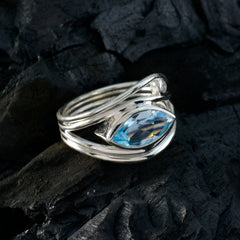 Putri silver ring featuring a blue abstract toi et moi ring design with a marquise blue gemstone