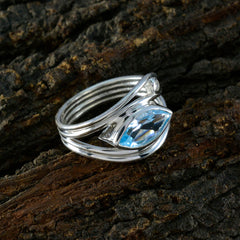 Putri silver ring featuring blue abstract toi et moi ring design with marquise blue gemstone
