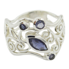 Gabriela blue filigree gemstone ring with intricate silver swirls and multiple blue gemstones