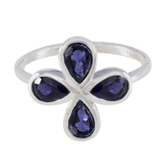 Nella blue floral gemstone ring with four teardrop-shaped deep blue stones in silver setting