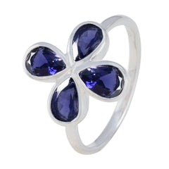 Nella blue floral gemstone ring with four teardrop-shaped blue stones set in silver band