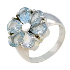 Lucia blue floral gemstone ring with pear-shaped blue stones set in silver band