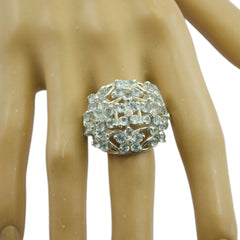 Dayana silver blue floral statement ring with intricate flower design on finger