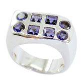Olivia blue gemstone artisan ring with multiple square and round blue stones set in silver band