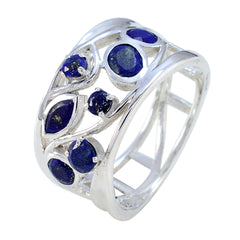 Nora blue gemstone filigree ring with intricate silver design and multiple deep blue stones