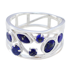 Nora blue gemstone filigree ring with multiple deep blue stones set in silver intricate band