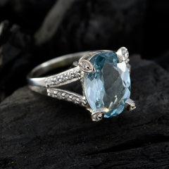 Nora Blue Gemstone Halo Ring with Sparkling Accents
