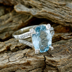 Nora Blue Gemstone Halo Ring with Sparkling Accents