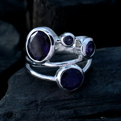 Patricia blue gemstone ring for women with multiple round blue stones set in silver band